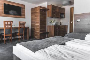 Фото номера Апартаменты Делюкс Апартаменты GORSKI RESORT Zakopane г. Поронин 10