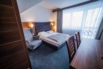 Фото номера Двухместный номер Делюкс с 1 кроватью Апартаменты GORSKI RESORT Zakopane г. Поронин 7