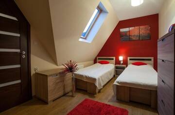 Фото номера Deluxe Double Room with Bath and shared Kitchenette Апартаменты Willa Pod Grapą г. Поронин 4