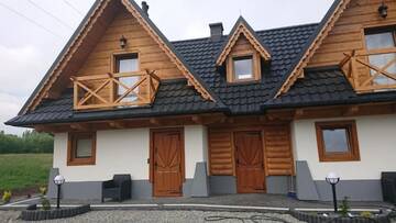 Фото номера Дом с 2 спальнями Дома для отпуска Domki Dream House ,,Jędruś" г. Поронин 20