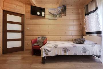 Фото номера Дом с 7 комнатами Дома для отпуска Domki Dream House ,,Jędruś" г. Поронин 13
