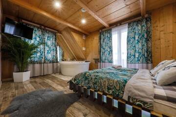 Фото номера King Room with Mini Jacuzzi and Private Bathroom Проживание в семье GÓRALSKA VILLA APARTAMENTY Z JACUZZI &amp; HOME SPA &amp; Zakopane г. Поронин 12
