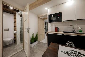 Фото номера Two-Bedroom Apartment with Mini Jacuzzi, Private Bathroom and Kitchen Проживание в семье GÓRALSKA VILLA APARTAMENTY Z JACUZZI &amp; HOME SPA &amp; Zakopane г. Поронин 4