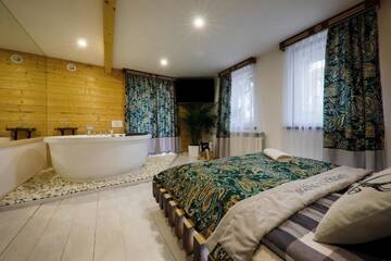 Фото номера Two-Bedroom Apartment with Mini Jacuzzi, Private Bathroom and Kitchen Проживание в семье GÓRALSKA VILLA APARTAMENTY Z JACUZZI &amp; HOME SPA &amp; Zakopane г. Поронин 8