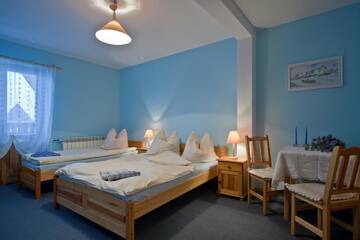 Фото номера Трехместный номер Отели типа «постель и завтрак» Apartamenty Matuska г. Поронин 3